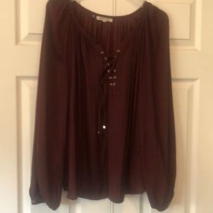 Beautiful Jennifer Lopez silky burgundy blouse
